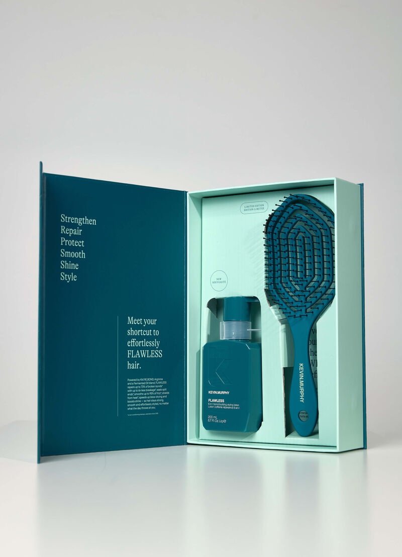 Open Kevin Murphy FLAWLESS Intro Kit gift box with the lotion and DE.TANGLING brush