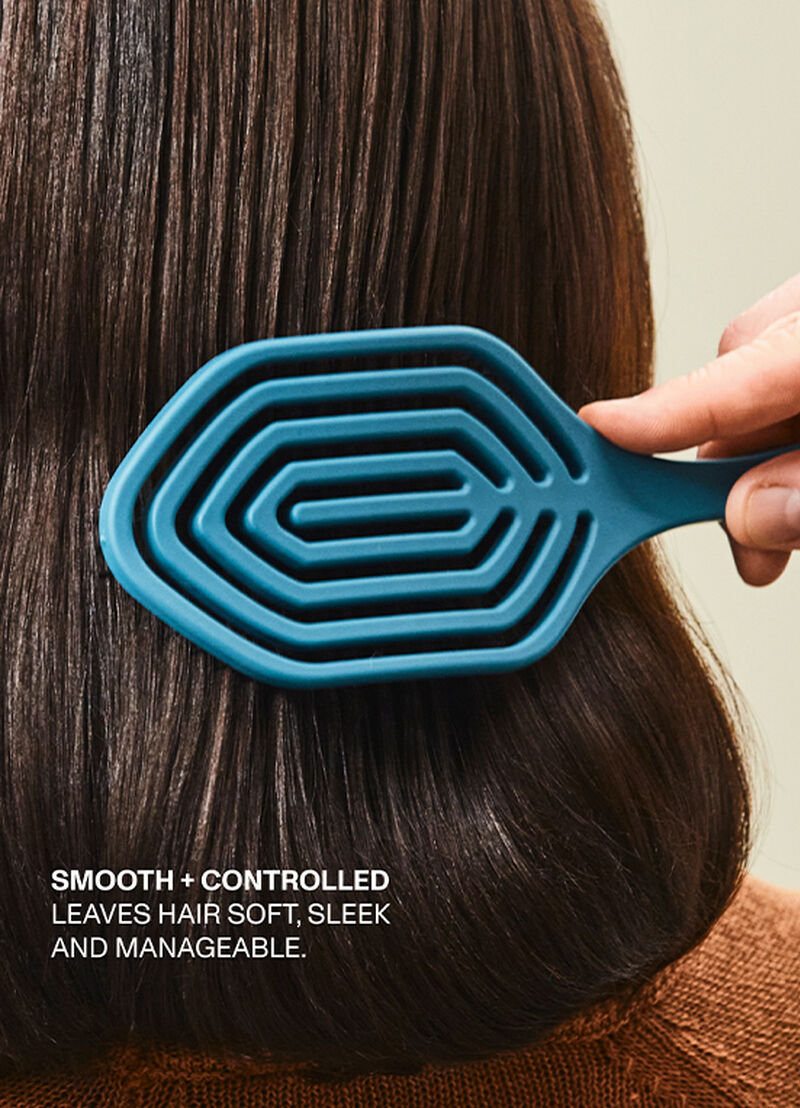 Kevin Murphy DE.TANGLING brush on long dark hair